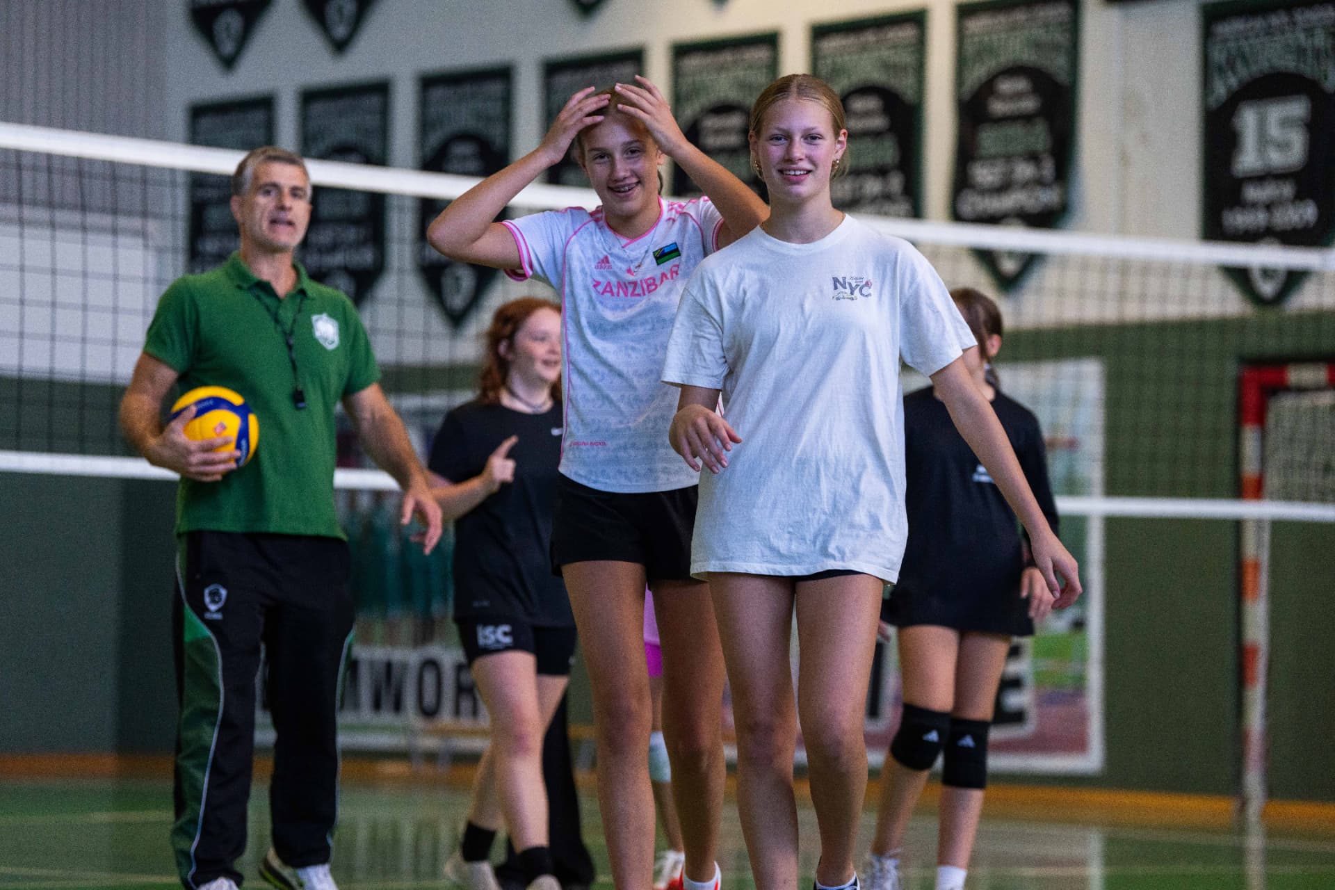 Young volleyball player serving during a Knights league session in Vienna