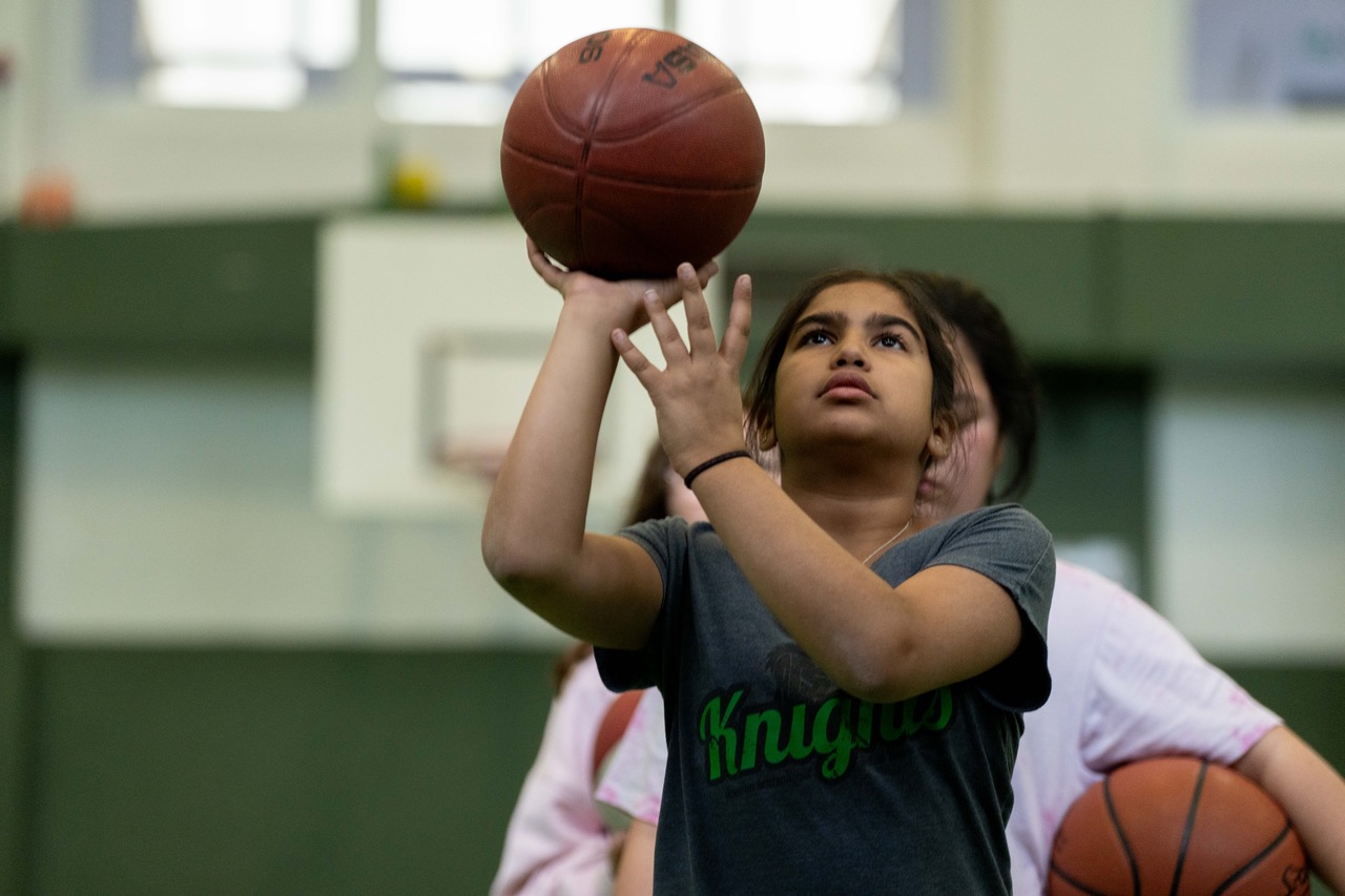 Coach instructing player